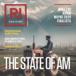 Cover of Radio Ink magazine, September 2024 edition, featuring a man sitting on an old tractor in a field with a mountain backdrop, emphasizing articles on the Radio Wayne finalists, marketing strategies, and industry insights.