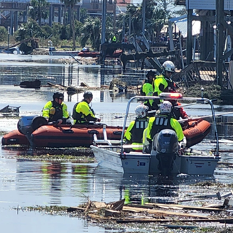 Big Bend Region, Florida - Coast Guard personnel from the Gulf Strike team and Station Pascagoula conducting urban search and rescue operations alongside federal and state partners to assist stranded people