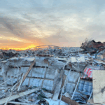 Mayfield, KY, December 24, 2021: Buildings in the downtown business area are scattered with debris and some destroyed from the string of tornadoes that impacted the area.