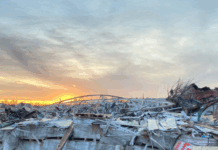 Mayfield, KY, December 24, 2021: Buildings in the downtown business area are scattered with debris and some destroyed from the string of tornadoes that impacted the area.