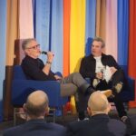 BFOA’s Media Mixer Tour Brings Pittman To Chicago Two men in conversation on stage at the Broadcasters Foundation of America Media Mixer in Chicago