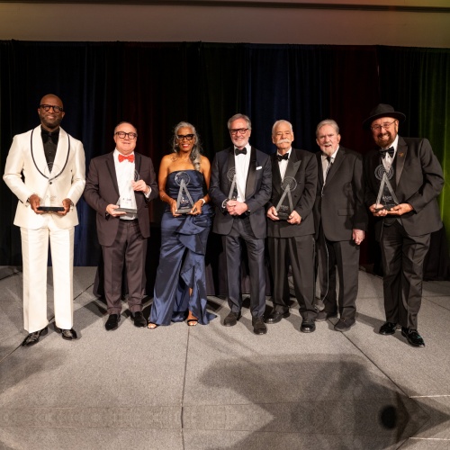 Radio Hall of Fame Class of 2026 Radio Hall of Fame Class of 2026 inductees holding their awards on stage in Chicago